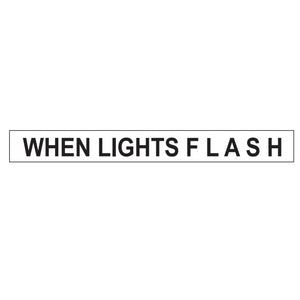 1200MM X 300MM - WHEN LIGHTS FLASH - CLASS 2 MATERIAL - STICKER